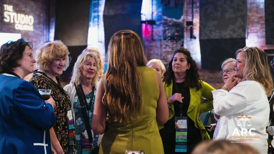 Attendees networking on the conference floor